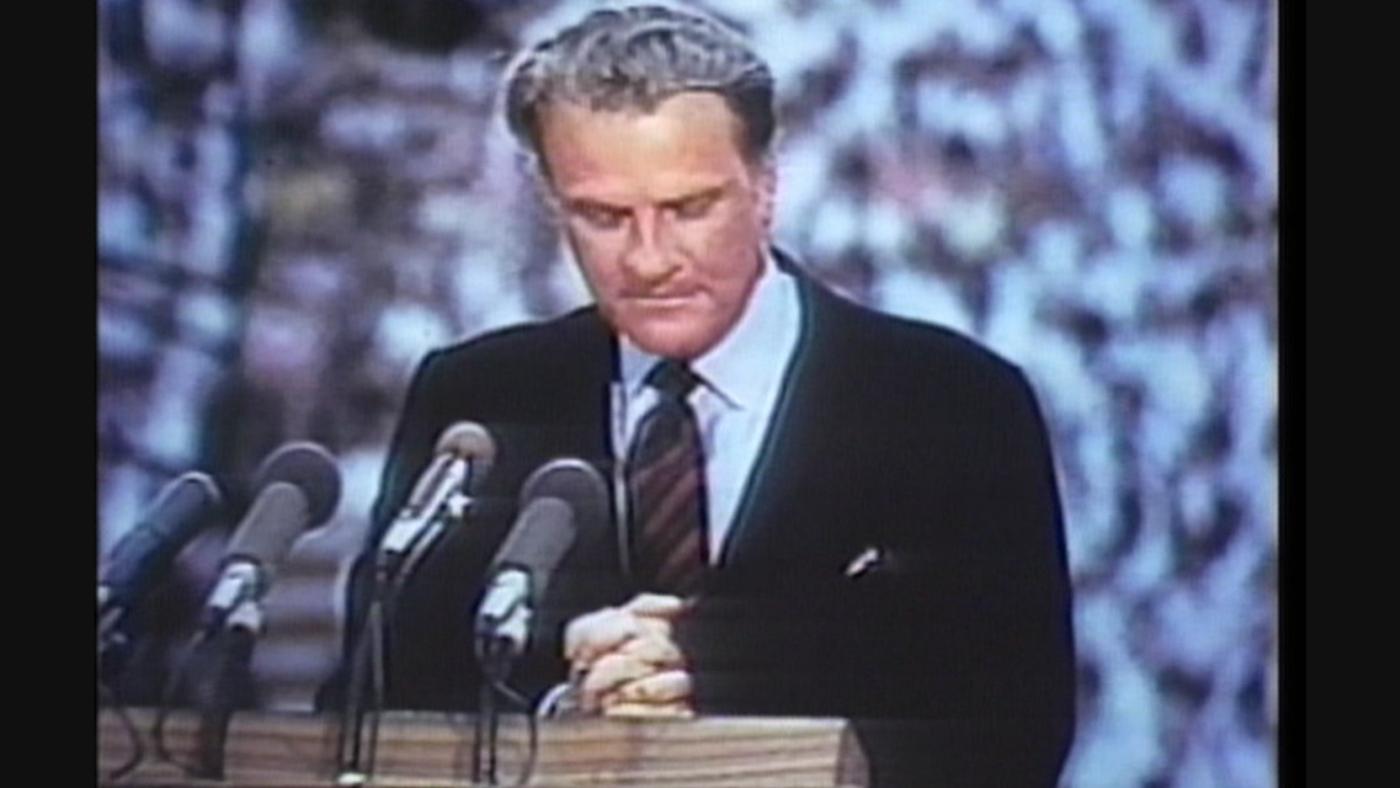 Billy Graham at one of his crusades in Knoxville, Tennessee in 1970, introducing Richard Nixon