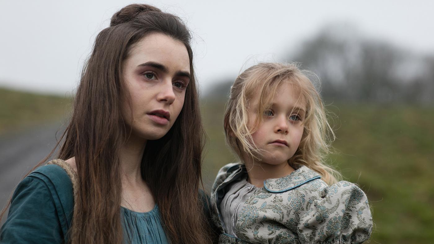Fantine (Lily Collins) and Cosette (Mailow Defoy) in Les Miserables. Photo: Robert Viglasky / Lookout Point