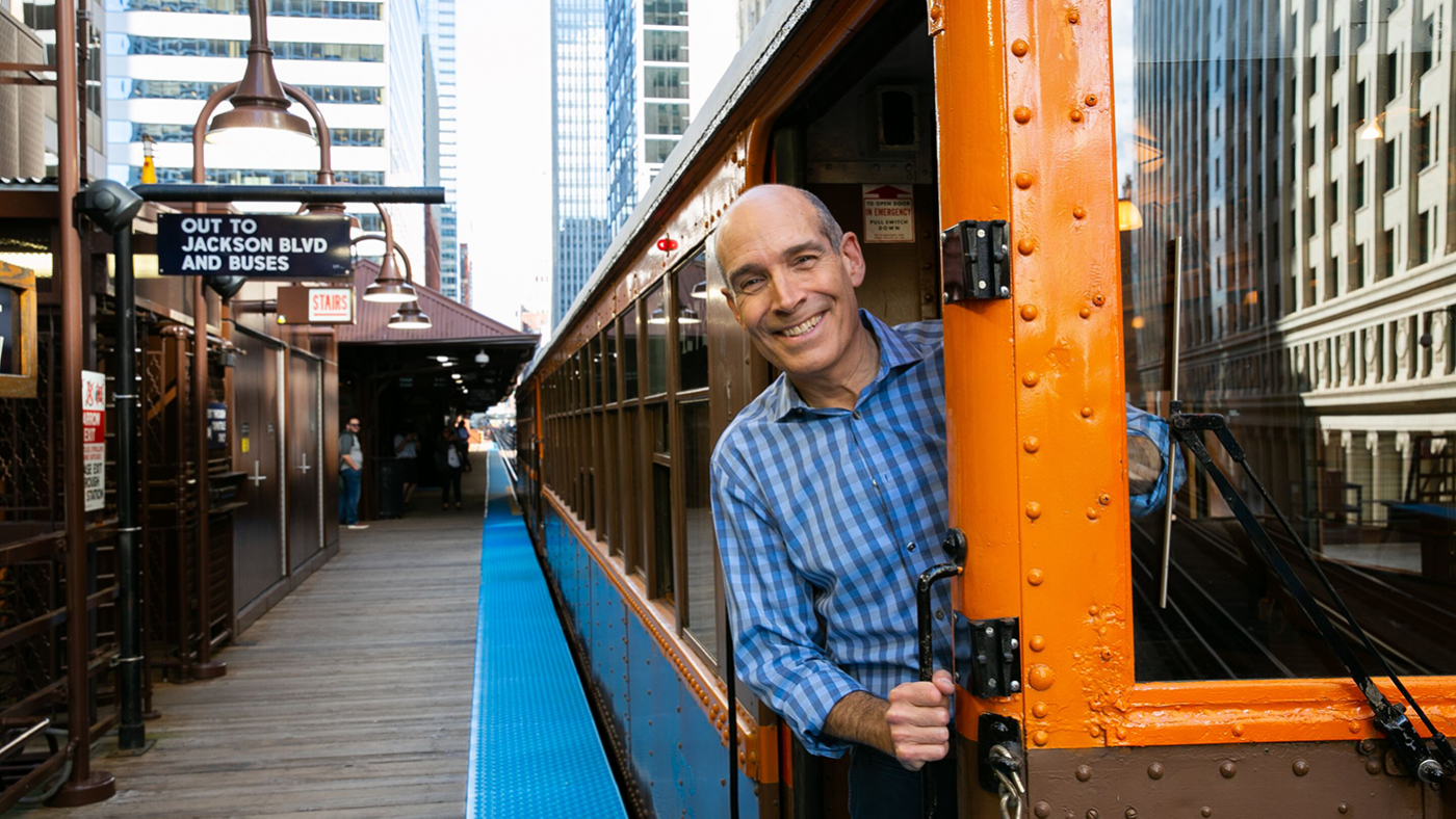 Geoffrey Baer riding a CTA heritage train in Chicago by 'L.' Photo: Kristan Lieb