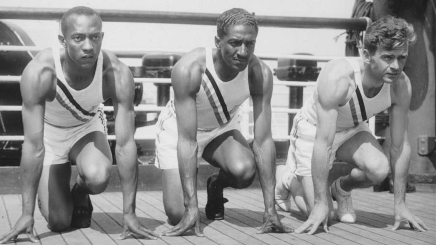 Photo of US Olympic team sprinters (from left) Jesse Owens, Ralph Metcalfe and Frank Wykoff on the deck of the S.S. Manhattan before they sailed for Germany to compete in the 1936 Olympics. Photo: Public domain/Wikimedia Commons