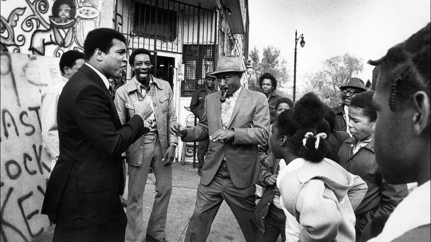 Muhammad Ali enjoying a spontaneous encounter with his fans in Detroit, MI. Circa 1977. Photo: Courtesy Michael Gaffney