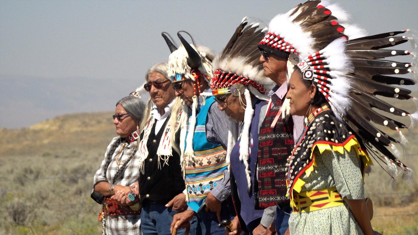 Tribals members pay their respects at Little Chief's reburial at Sharp Nose Cemetery, Wind River Reservation, WY (From Left: Fay Ann Soldier Wolf, Mark Soldier Wolf, Hubert Friday, Nelson White, Crawford White, Yufna Soldier Wolf), 2017. Photo: Caldera Productions