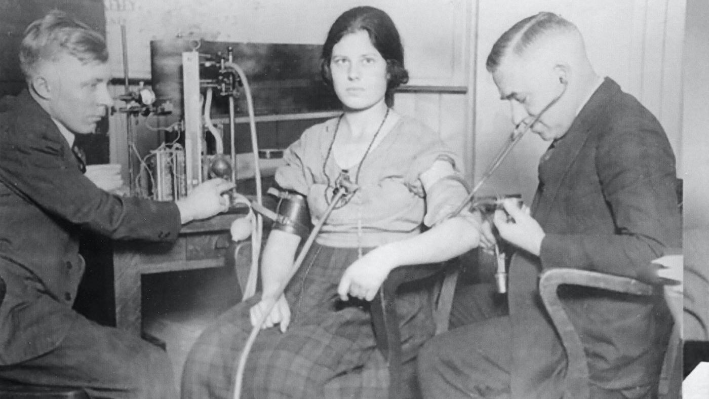 John Larson (left) and August Vollmer interrogate an unknown Berkeley undergraduate in 1921 or 1922