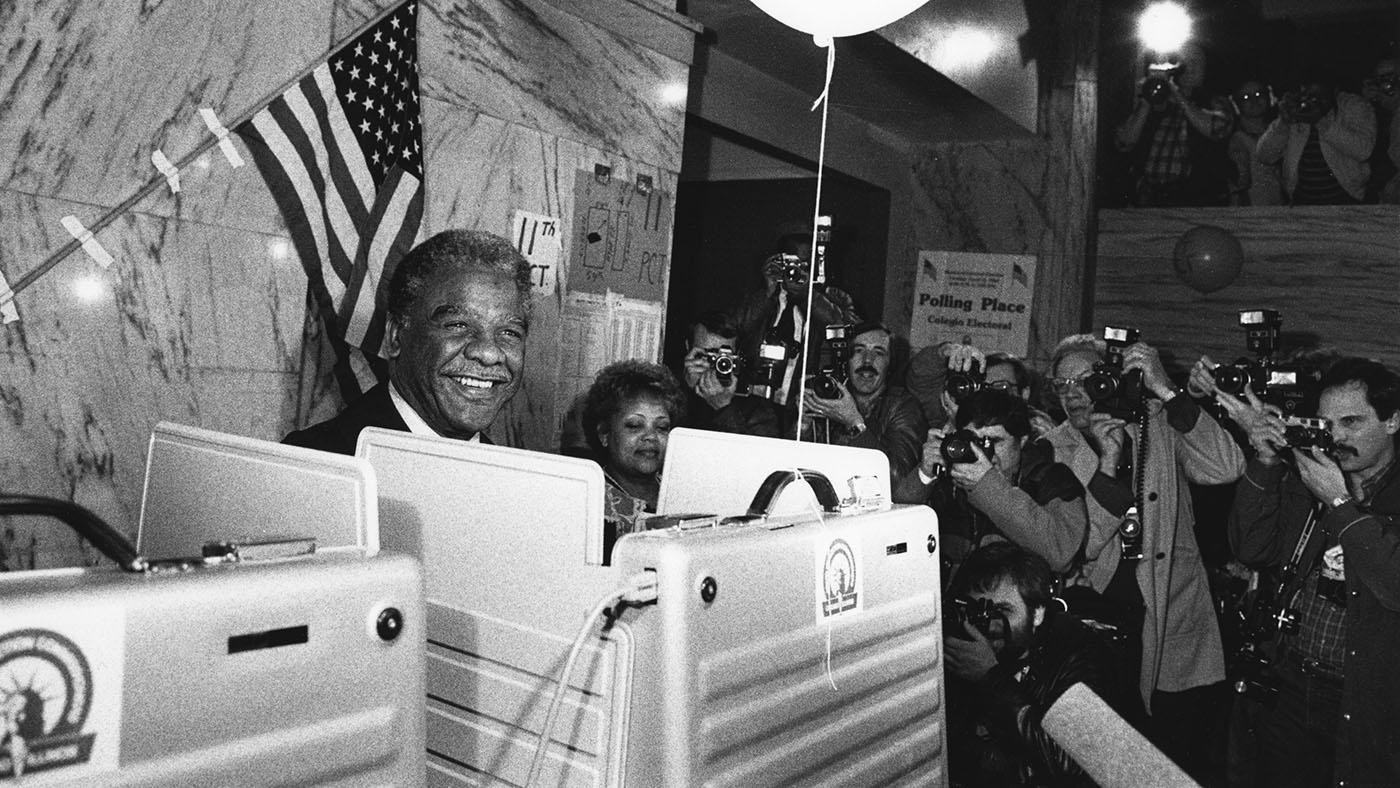 A black and white image of Harold Washington voting in Hyde Park on April 12, 1983. Image: Chicago History Museum, ICHi-036028; Richard Gordon, photographer