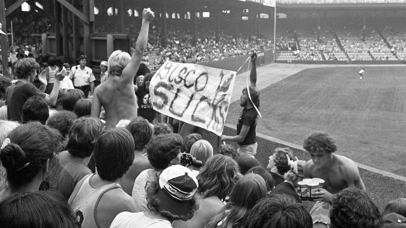 Fans hold a banner that reads "Disco Sucks" at Comiskey Park