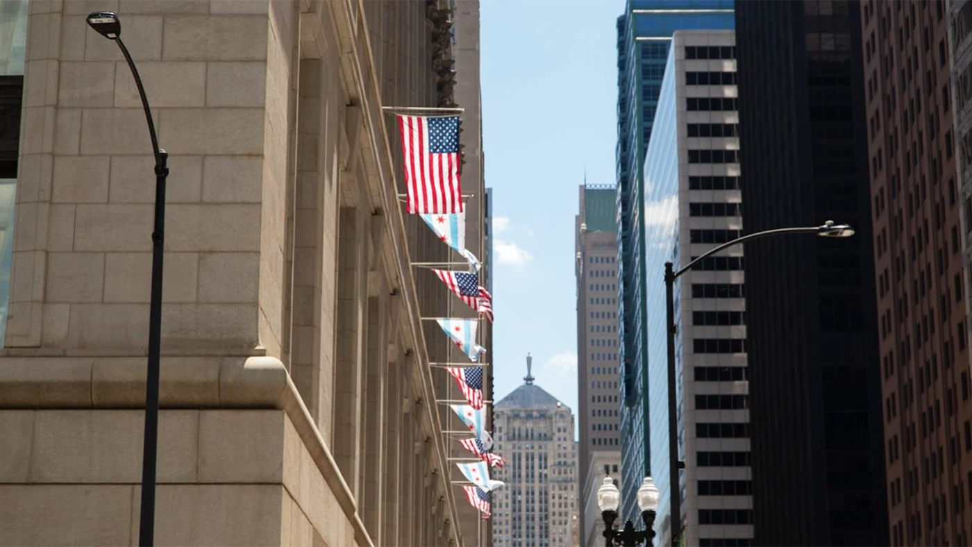 Flags hanging from the facade of Chicago's City Hall. 