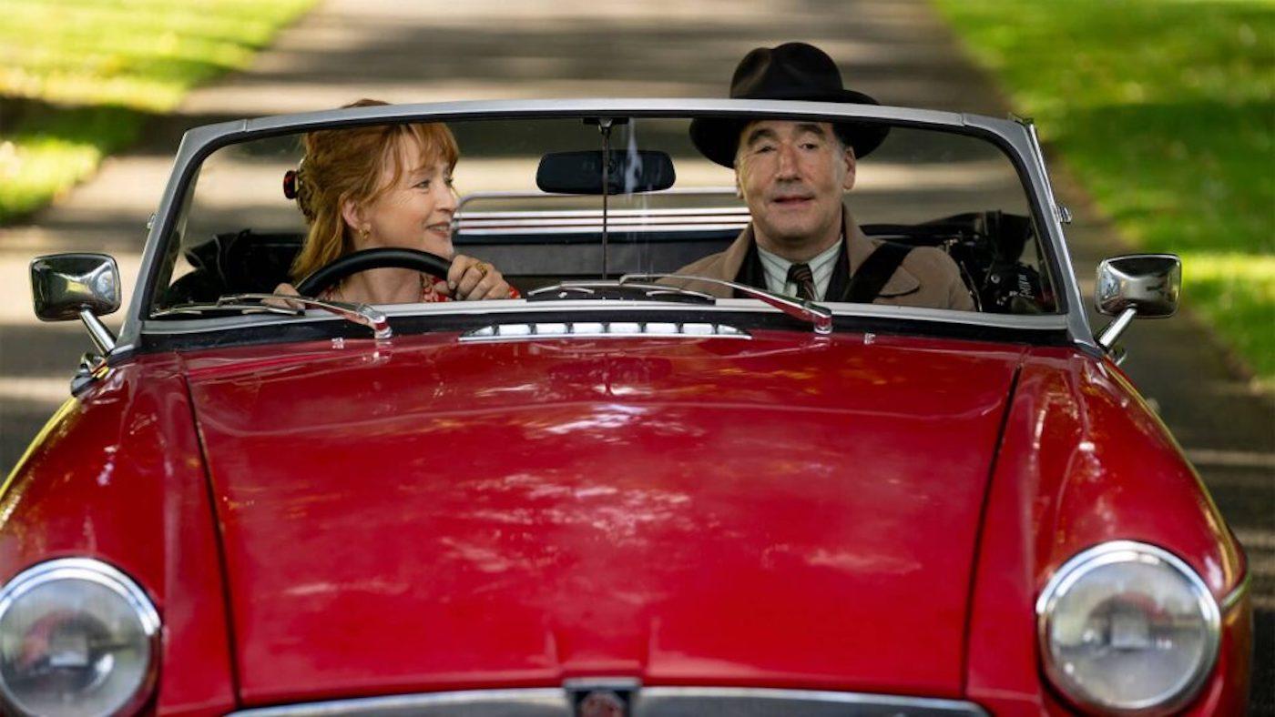 Susan Ryeland and Atticus Pünd in a red open top car