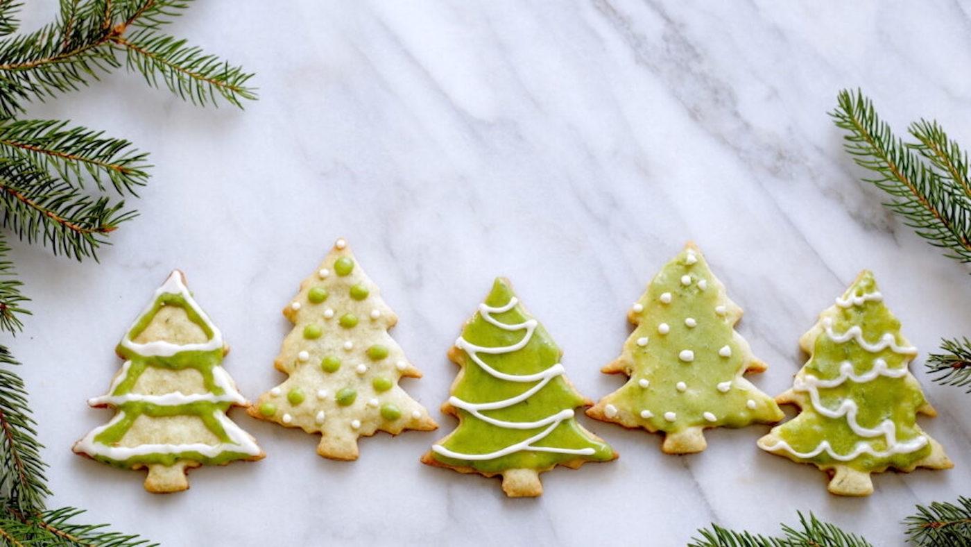 Christmas tree shaped cookies on a table